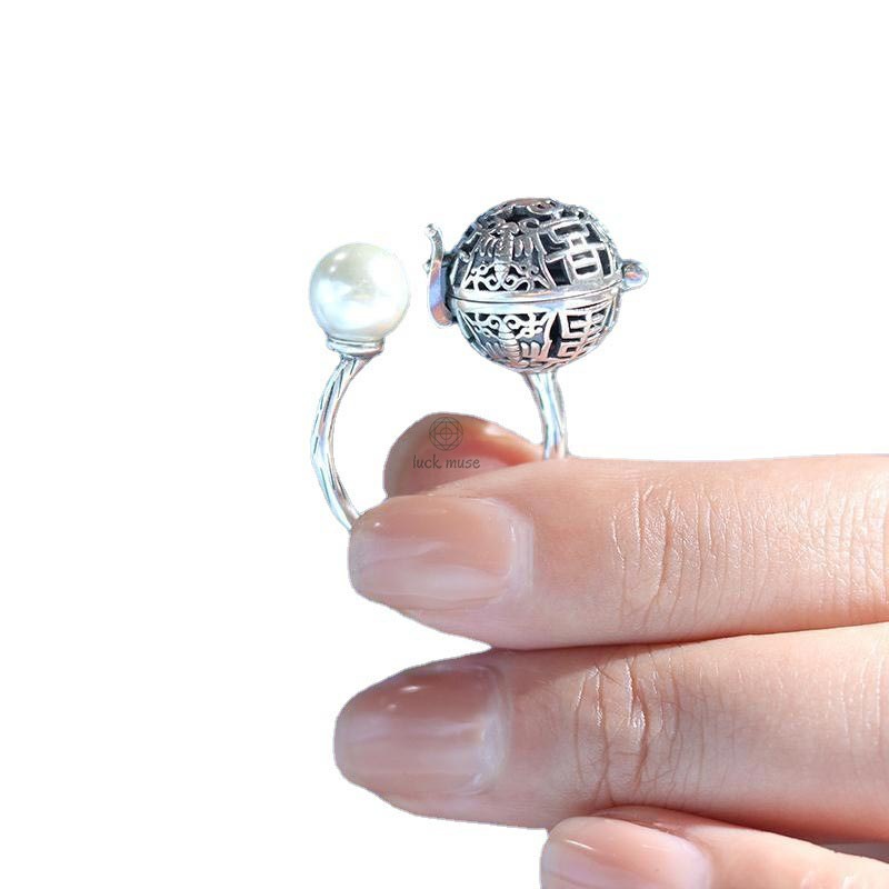 Sterling Silver Pearl Ball Ring with Sachet Design