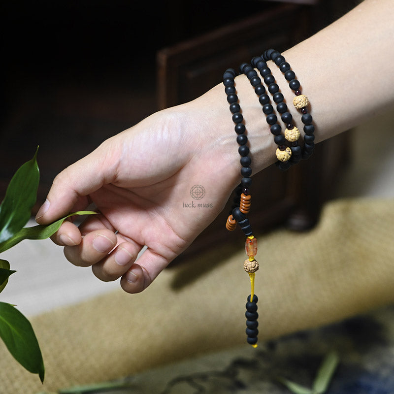 Tibetan Mala Bracelet with Cypress Bodhi Seeds and Red Agate Healing Properties - Image 5