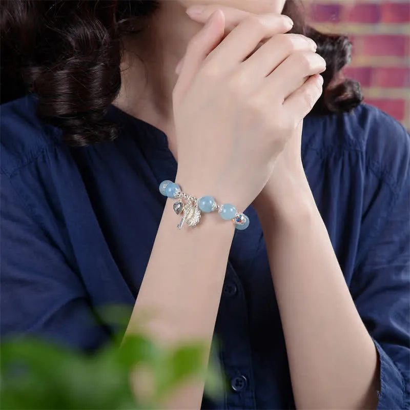 925 Sterling Silver Aquamarine Serenity Flower Key Charm Bracelet - Image 3