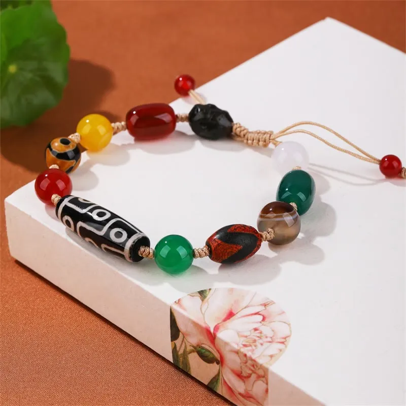 Tibetan Nine-Eye Dzi Bead Agate Bracelet for Wealth Protection at Luck Muse Shop