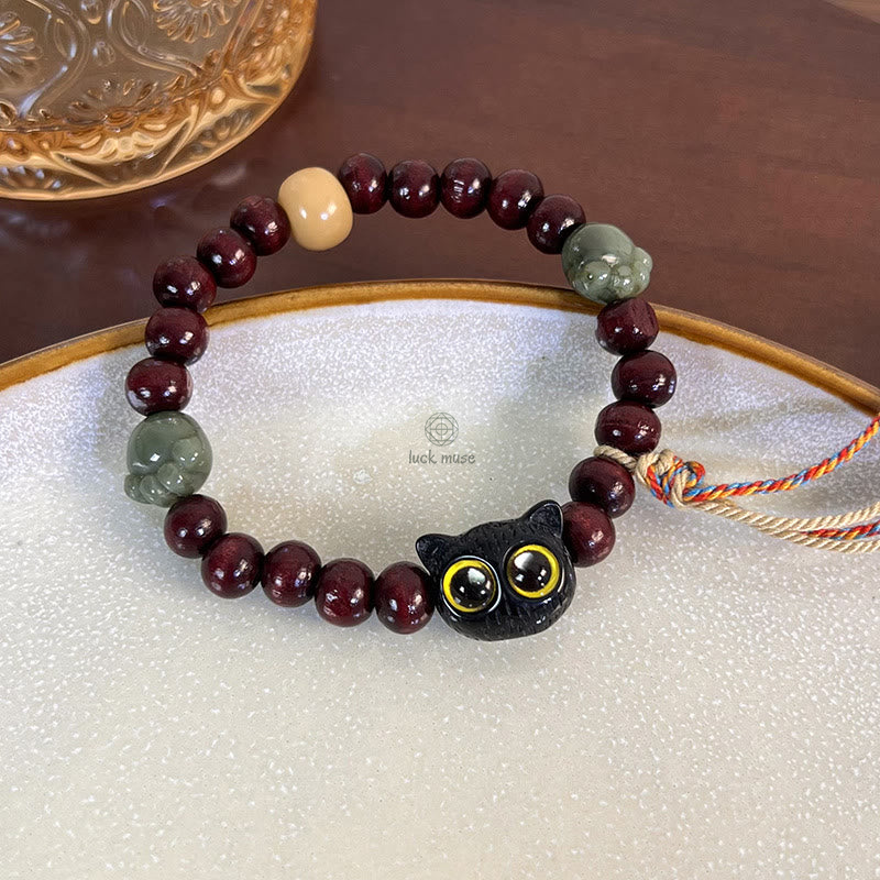 Luck Muse Ebony Wood Cat Paw Jade Peace Tassel Bracelet - Image 6