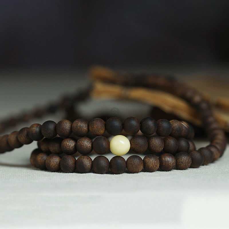 Luck Muse 999 Gold Tarakan 108 Mala Beads Bracelet with Agarwood & Amber for Evil Spirits Protection - Image 17