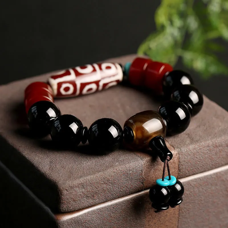 Tibetan Nine-Eye Dzi Bead Black Onyx Wealth Protection Bracelet in Luck Muse Shop