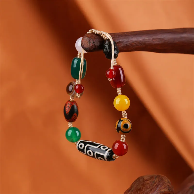 Tibetan Nine-Eye Dzi Bead Agate Bracelet for Wealth Protection at Luck Muse Shop - Image 4