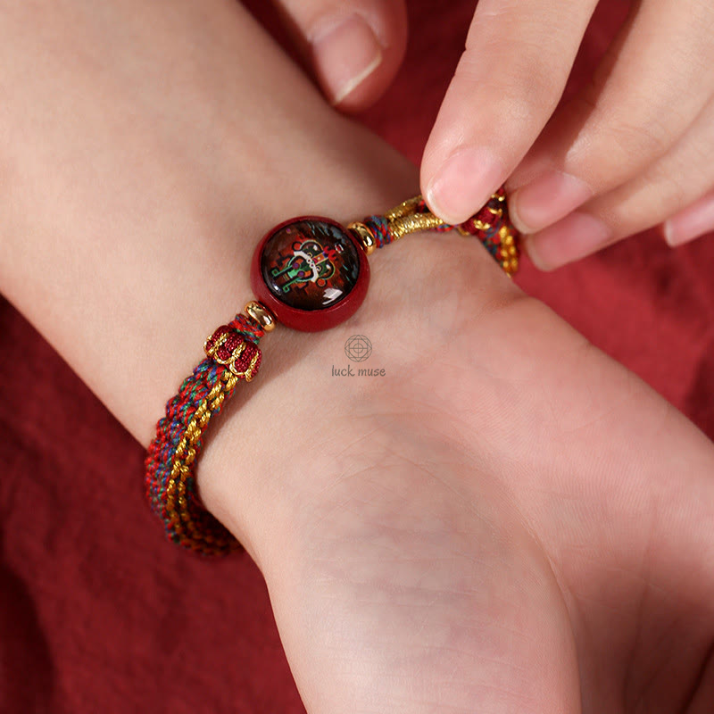Blessed Braided Bracelet with Colorful Rope and Cinnabar Thangka Essence - Image 6