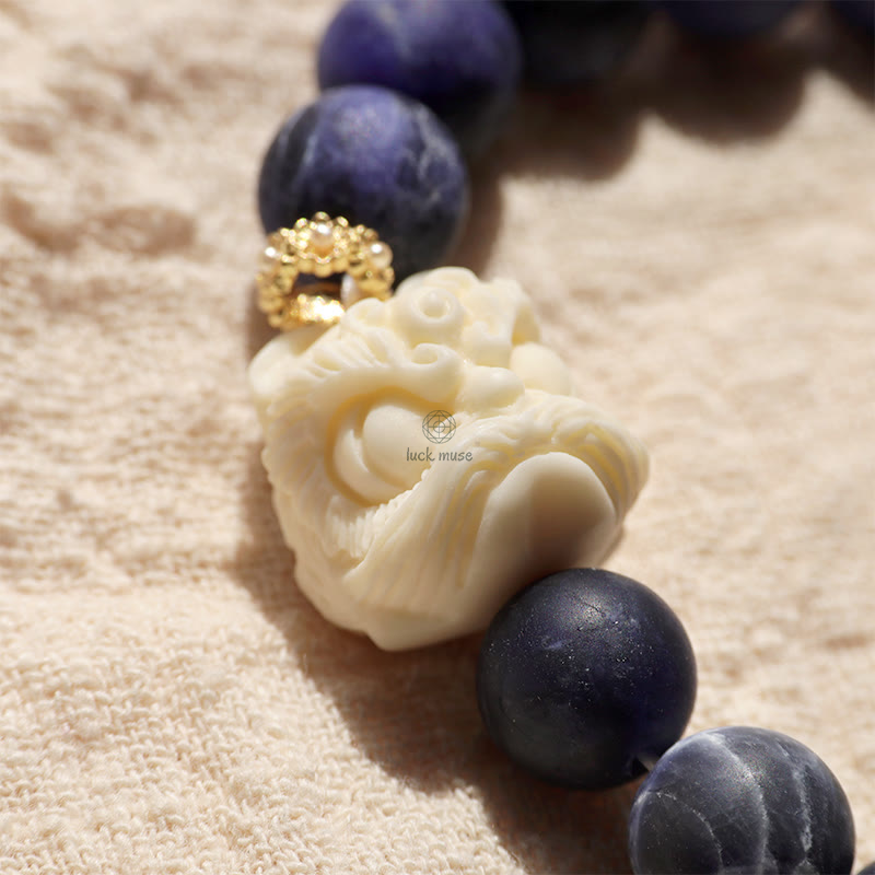 Luck Muse Sodalite Ivory Fruit Bracelet with Dancing Lion, Crescent Moon, and Harmony Design - Image 7