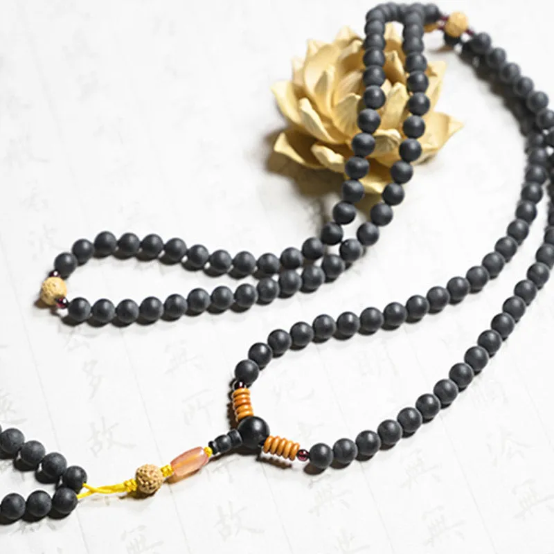 Tibetan Mala Bracelet with Cypress Bodhi Seeds and Red Agate Healing Properties - Image 10