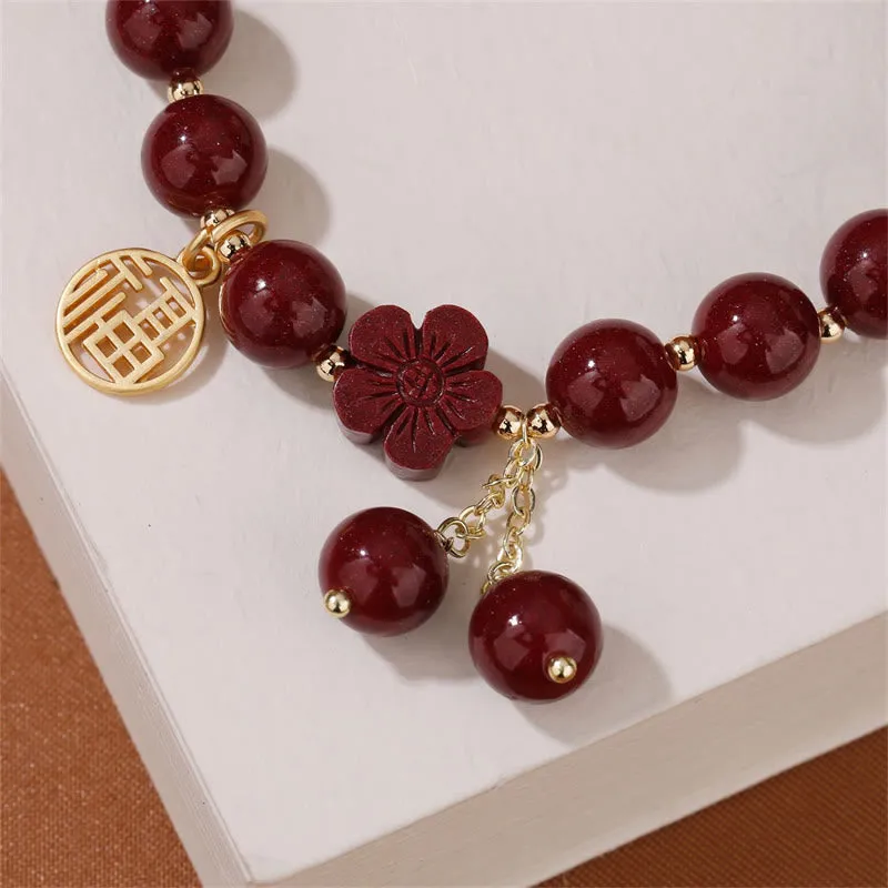 Cinnabar Fu Character Cherry Blossom Blessing Bracelet from Luck Muse Shop - Image 5