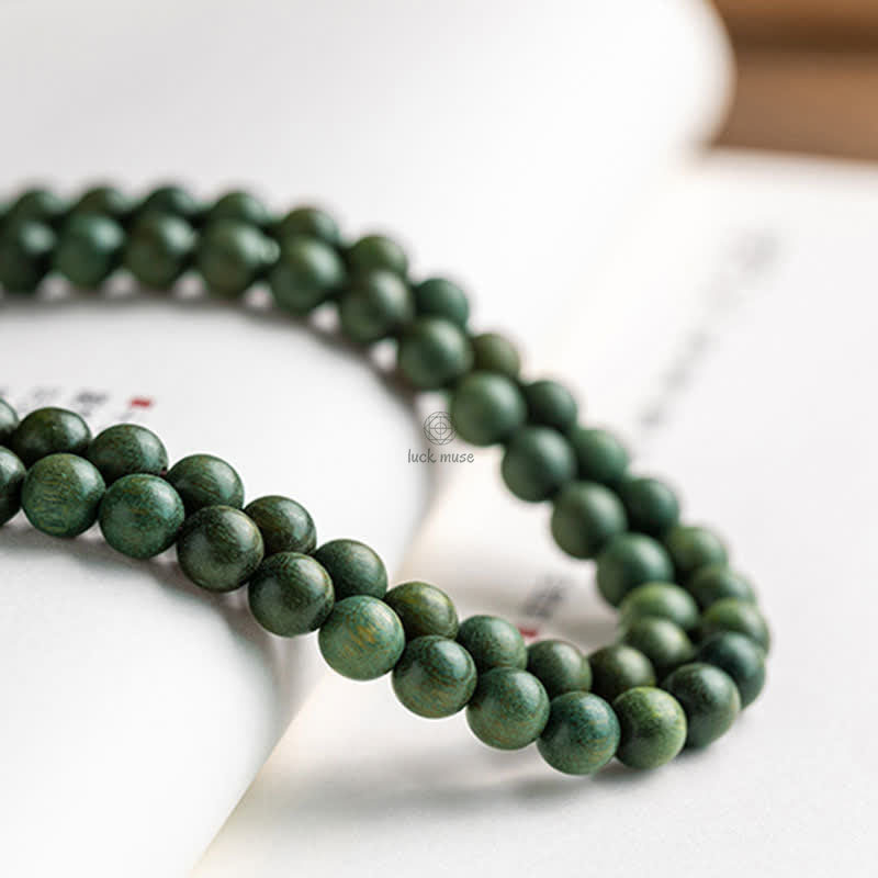 Luck Muse 108 Mala Beads Bracelet with Green Sandalwood Boxwood Lotus Design - Image 16