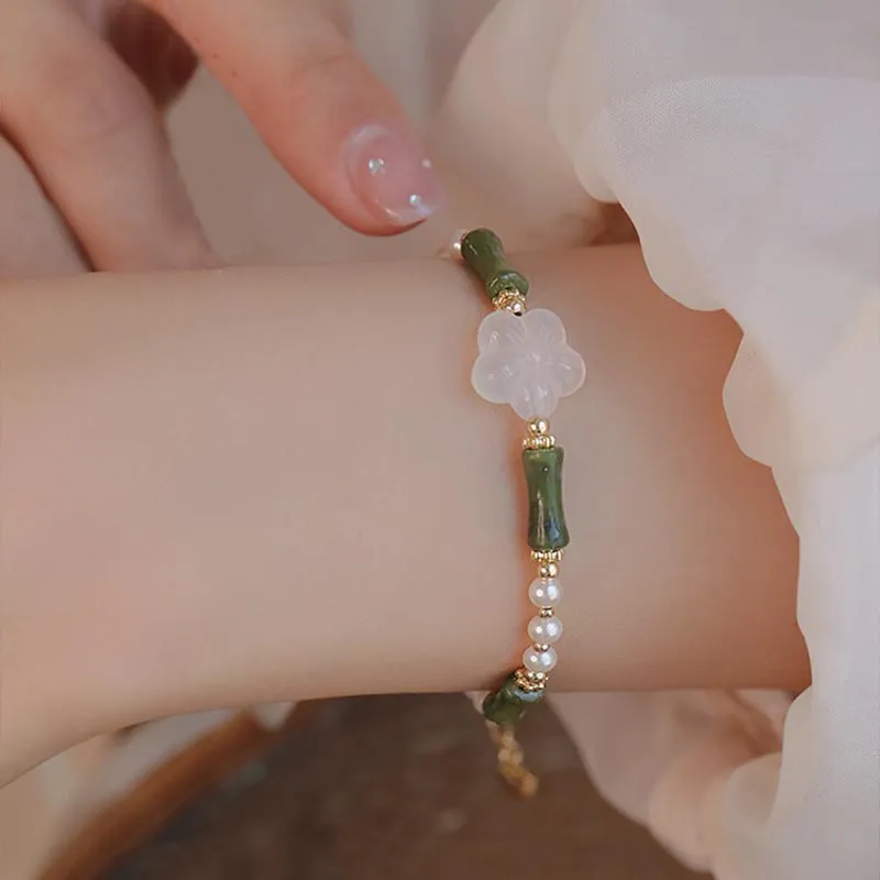 Peridot Agate and Pearl Bracelet with Luck Muse and Bamboo Flower Accents for Peace