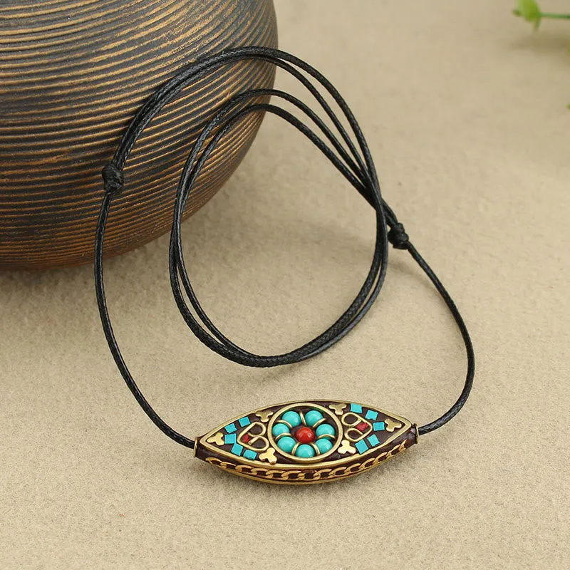 Tibet Turquoise Bead Necklace Pendant with Marquise Pattern for Protection and Strength - Image 2