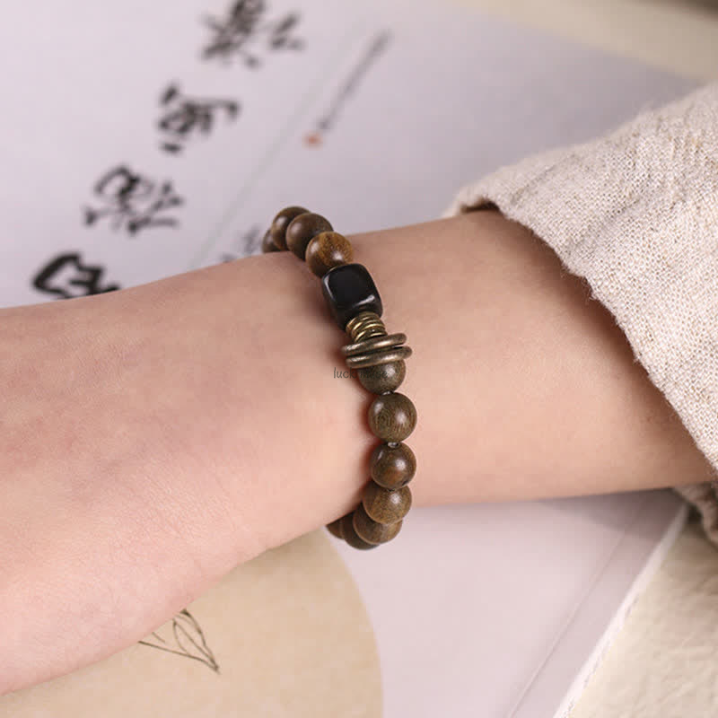 Green Sandalwood Crystal Peace Bracelet inspired by Tibetan Culture - Image 4