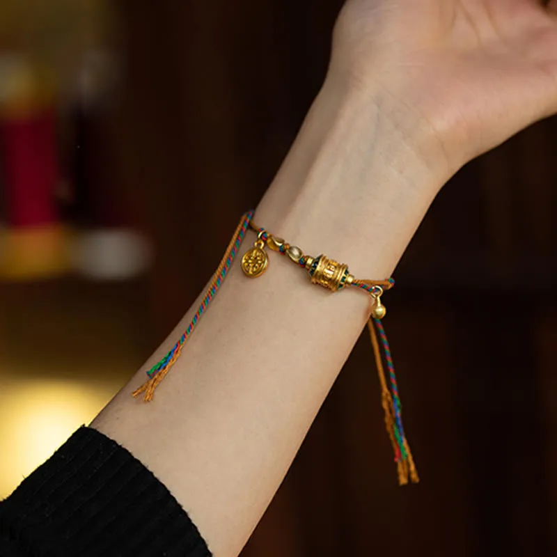 Handmade Tibetan Om Mani Padme Hum Prayer Wheel Bracelet for Protection and Strength - Image 3