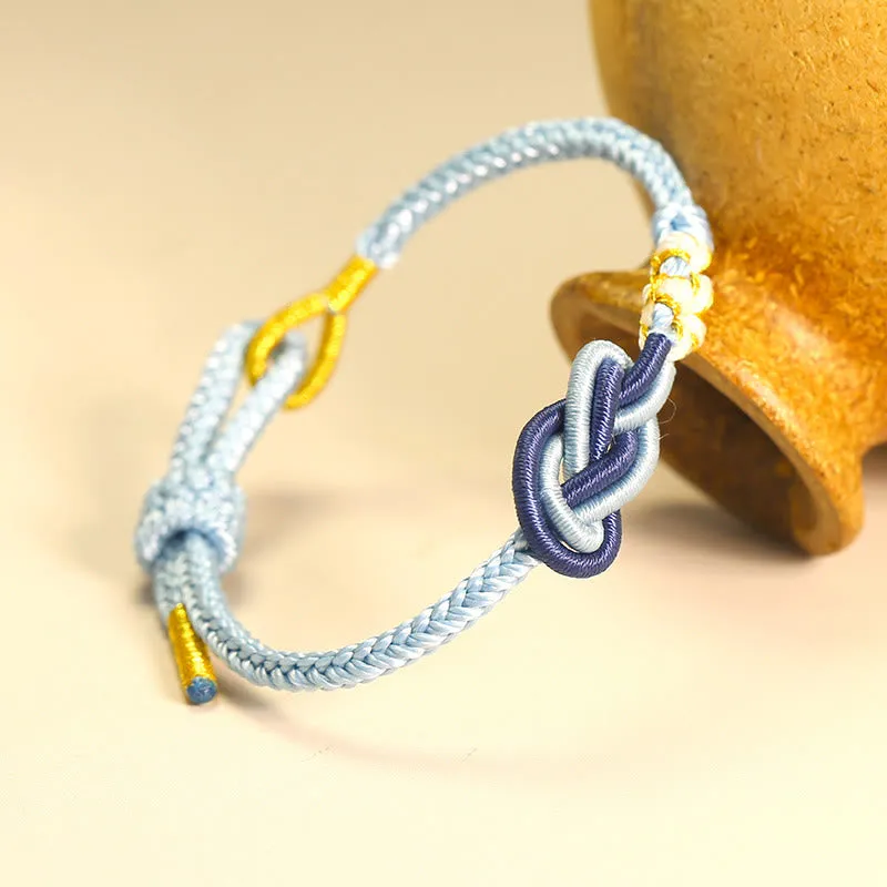 Handcrafted Eight-Thread Luck Muse Bracelet with Peace Knot, Peach Blossom Detail, and Luck Connection - Image 9