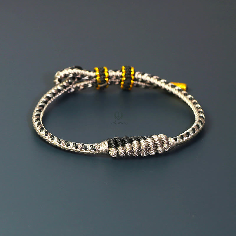 Tibetan Handmade Eight Thread Peace Knot Prayer Wheel Bracelet - Image 9