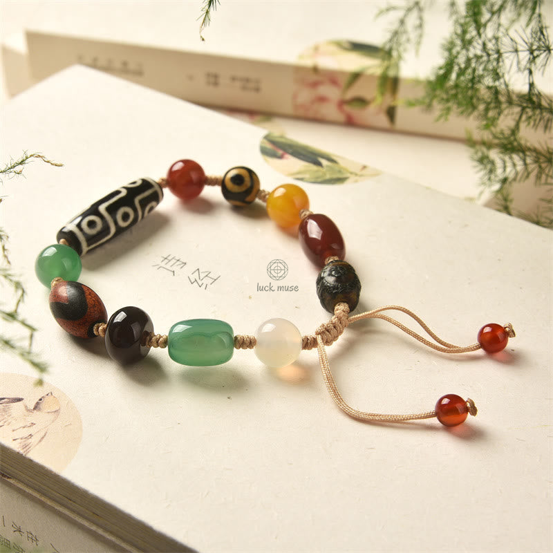 Tibetan Nine-Eye Dzi Bead Agate Bracelet for Wealth Protection at Luck Muse Shop - Image 11