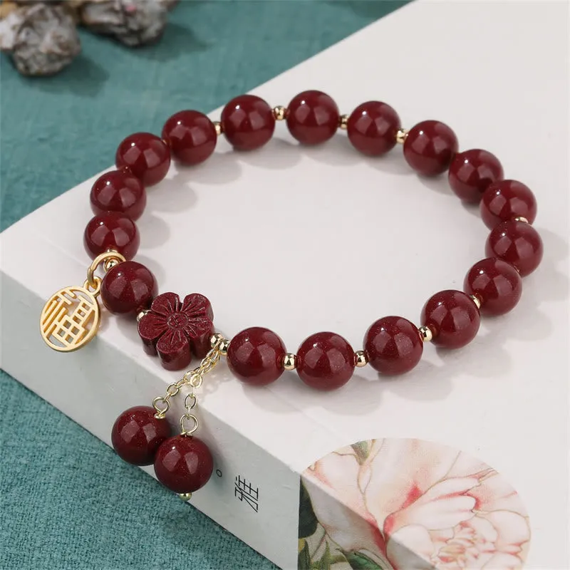 Cinnabar Fu Character Cherry Blossom Blessing Bracelet from Luck Muse Shop - Image 2