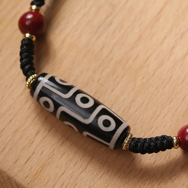 Handcrafted Tibetan Nine-eye Dzi Bead Protection Bracelet with Luck Muse Influence - Image 4