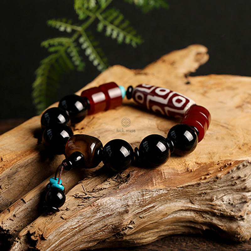 Tibetan Nine-Eye Dzi Bead Black Onyx Wealth Protection Bracelet in Luck Muse Shop - Image 6
