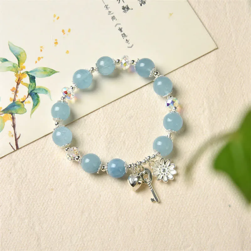 925 Sterling Silver Aquamarine Serenity Flower Key Charm Bracelet - Image 5