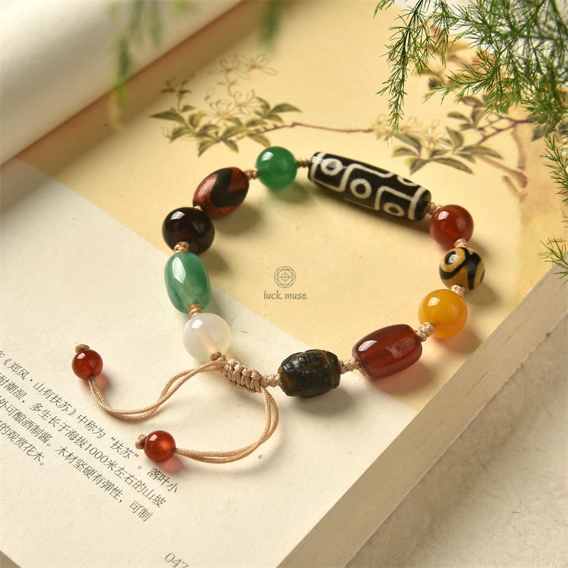 Tibetan Nine-Eye Dzi Bead Agate Bracelet for Wealth Protection at Luck Muse Shop - Image 8