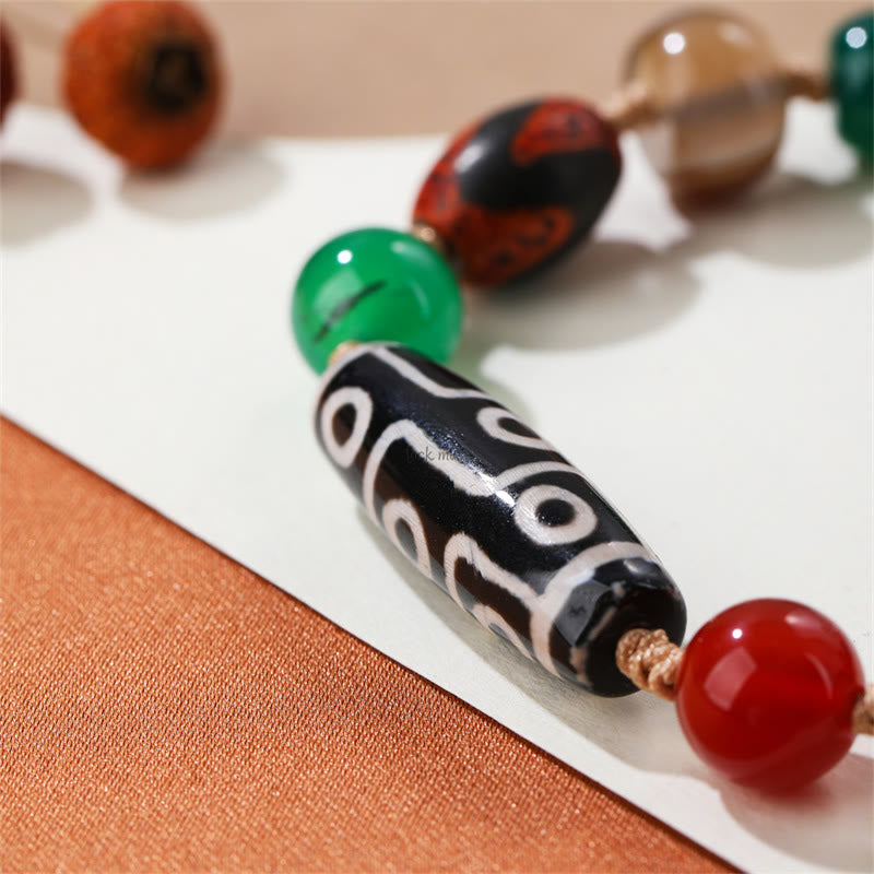 Tibetan Nine-Eye Dzi Bead Agate Bracelet for Wealth Protection at Luck Muse Shop - Image 6