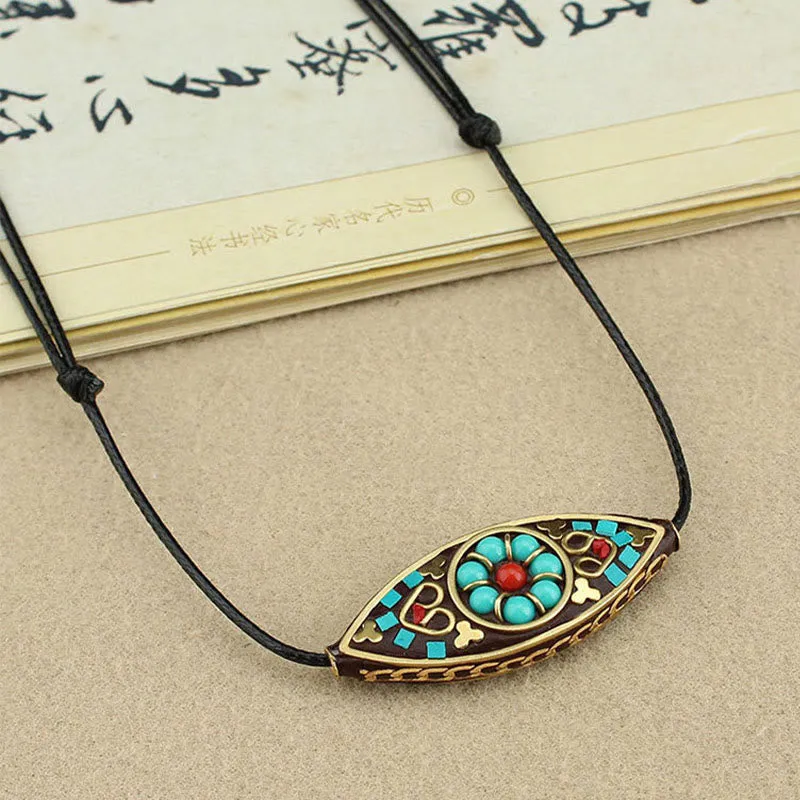 Tibet Turquoise Bead Necklace Pendant with Marquise Pattern for Protection and Strength - Image 4