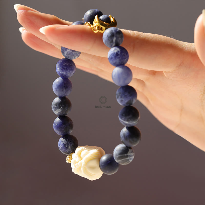 Luck Muse Sodalite Ivory Fruit Bracelet with Dancing Lion, Crescent Moon, and Harmony Design - Image 8