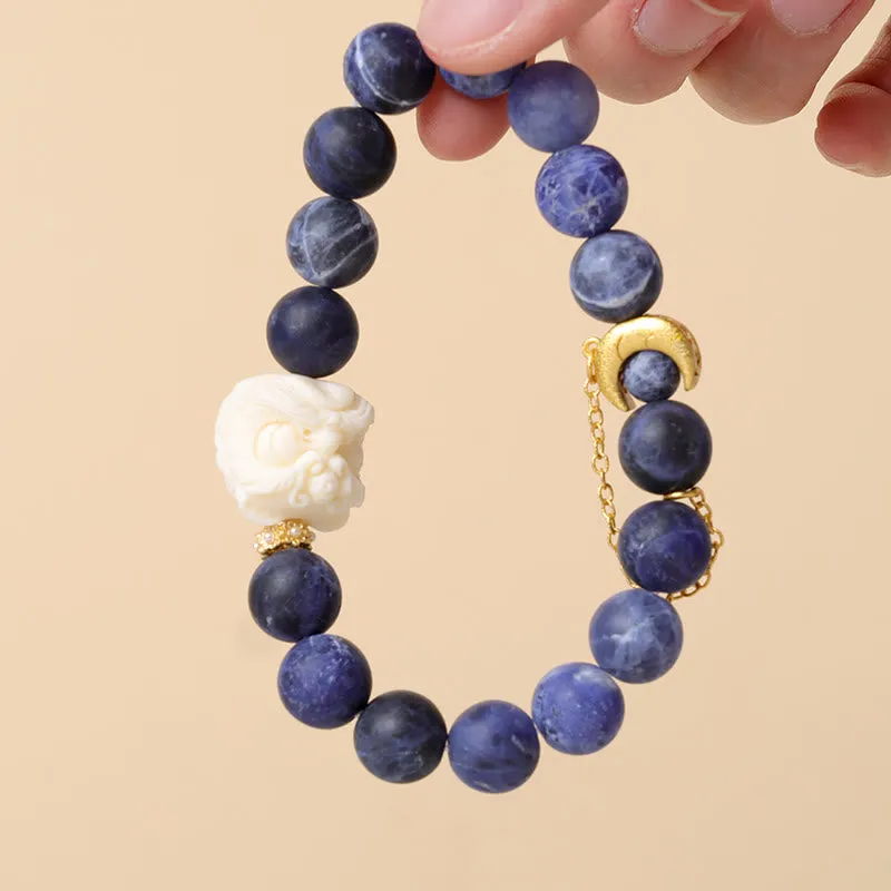 Luck Muse Sodalite Ivory Fruit Bracelet with Dancing Lion, Crescent Moon, and Harmony Design - Image 2