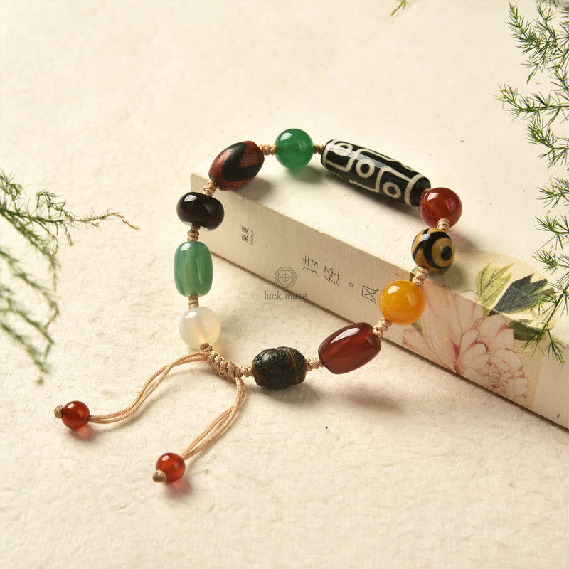 Tibetan Nine-Eye Dzi Bead Agate Bracelet for Wealth Protection at Luck Muse Shop - Image 7