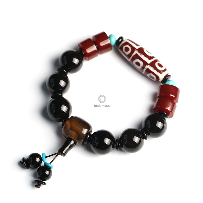 Tibetan Nine-Eye Dzi Bead Black Onyx Wealth Protection Bracelet in Luck Muse Shop - Image 9