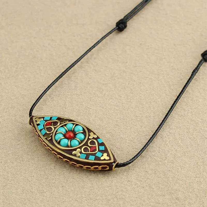 Tibet Turquoise Bead Necklace Pendant with Marquise Pattern for Protection and Strength - Image 5