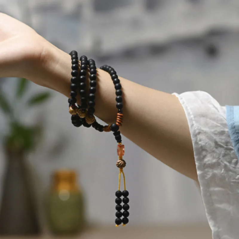 Tibetan Mala Bracelet with Cypress Bodhi Seeds and Red Agate Healing Properties - Image 7
