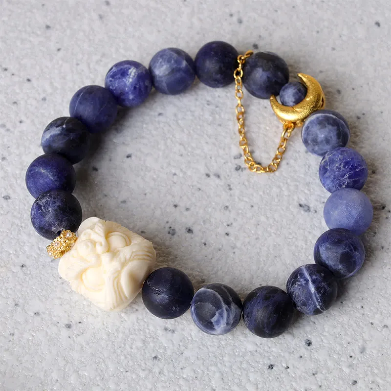 Luck Muse Sodalite Ivory Fruit Bracelet with Dancing Lion, Crescent Moon, and Harmony Design - Image 3