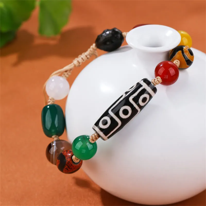 Tibetan Nine-Eye Dzi Bead Agate Bracelet for Wealth Protection at Luck Muse Shop - Image 3