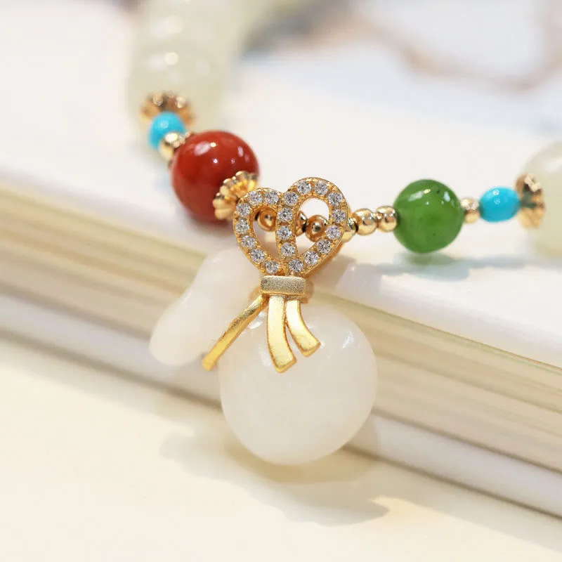 Luck Muse Hetian White Jade Bracelet with 14K Gold Plated Money Bag Blessing - Image 4