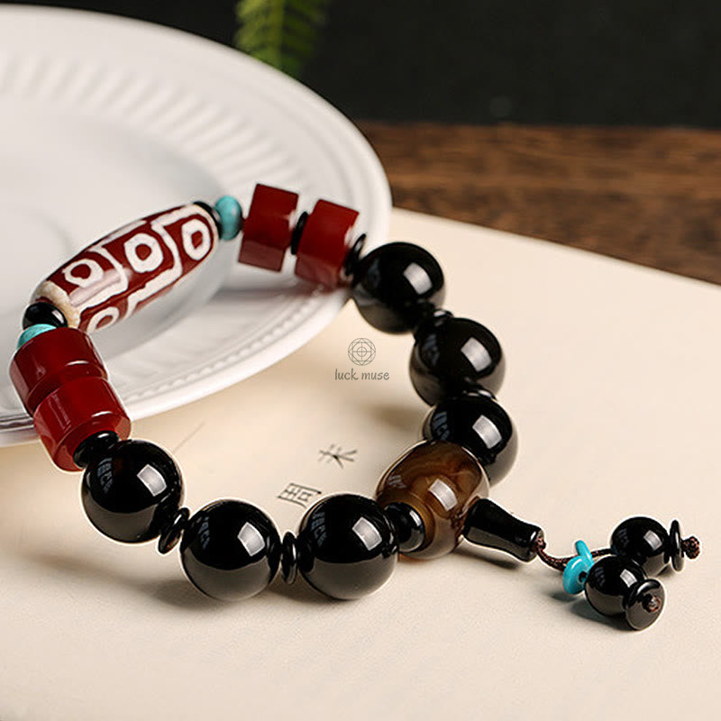 Tibetan Nine-Eye Dzi Bead Black Onyx Wealth Protection Bracelet in Luck Muse Shop - Image 7