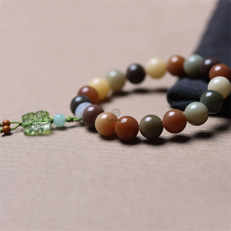 Multicolored Gradient Bodhi Seed and Liuli Glass Charm Bracelet infused with Luck Muse for Peace - Image 15
