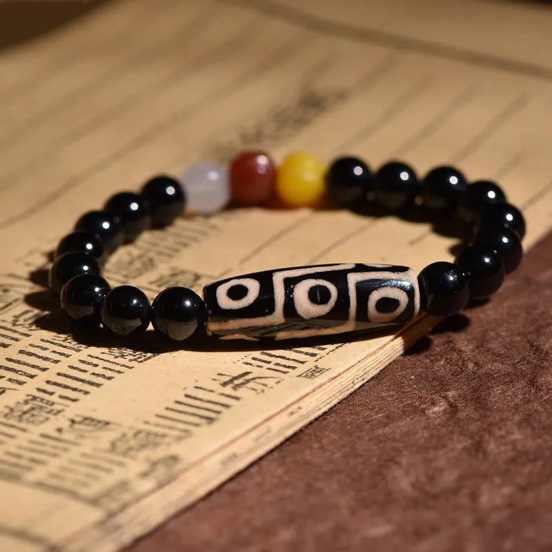 Natural Tibetan Nine-Eye Dzi Bead Bracelet for Wealth and Power - Image 3