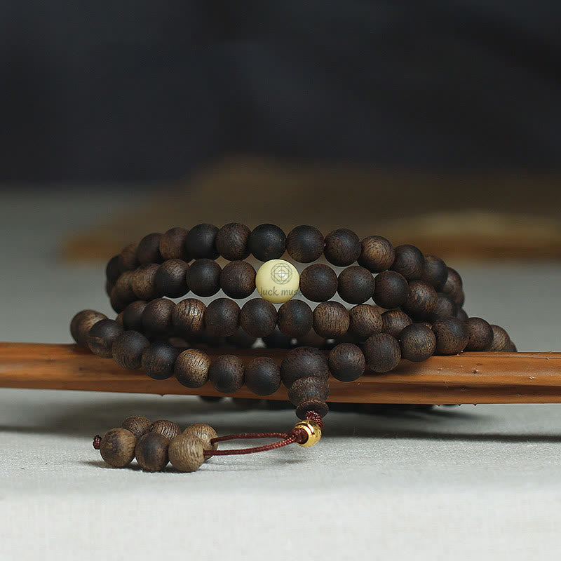Luck Muse 999 Gold Tarakan 108 Mala Beads Bracelet with Agarwood & Amber for Evil Spirits Protection - Image 2