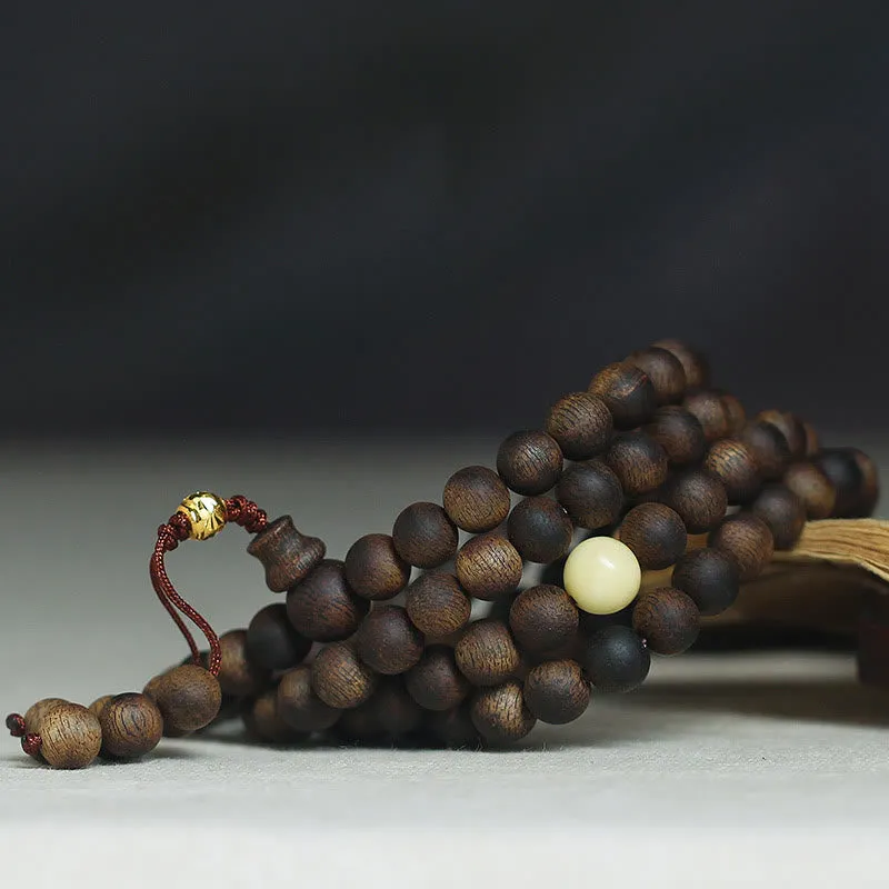 Luck Muse 999 Gold Tarakan 108 Mala Beads Bracelet with Agarwood & Amber for Evil Spirits Protection - Image 3