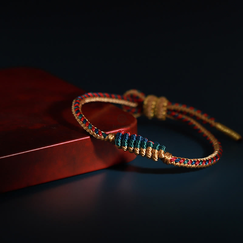 Tibetan Handmade Eight Thread Peace Knot Prayer Wheel Bracelet - Image 6