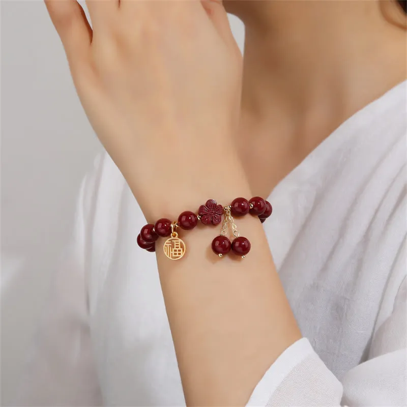 Cinnabar Fu Character Cherry Blossom Blessing Bracelet from Luck Muse Shop - Image 3