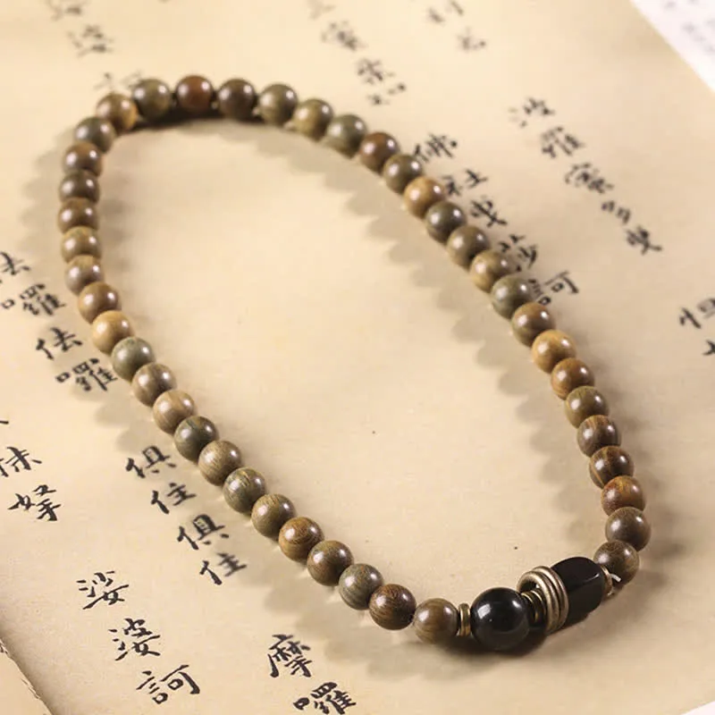 Green Sandalwood Crystal Peace Bracelet inspired by Tibetan Culture - Image 13